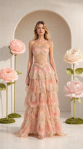 Full front view of strapless tiered tulle evening gown in blush pink with shimmer details