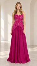 Front view of model wearing magenta strapless 3D floral chiffon evening gown