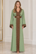 Sage green embroidered caftan maxi dress with brown belt front view