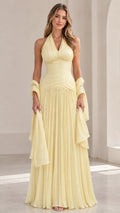 Front view of Butter Yellow halter ruched pleated maxi gown with matching shawl
