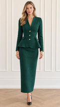 Full front view of model wearing emerald green tweed peplum blazer and matching maxi skirt set