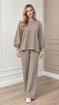 Full front view of model wearing taupe textured knit lounge set with lantern sleeves and wide-leg pants