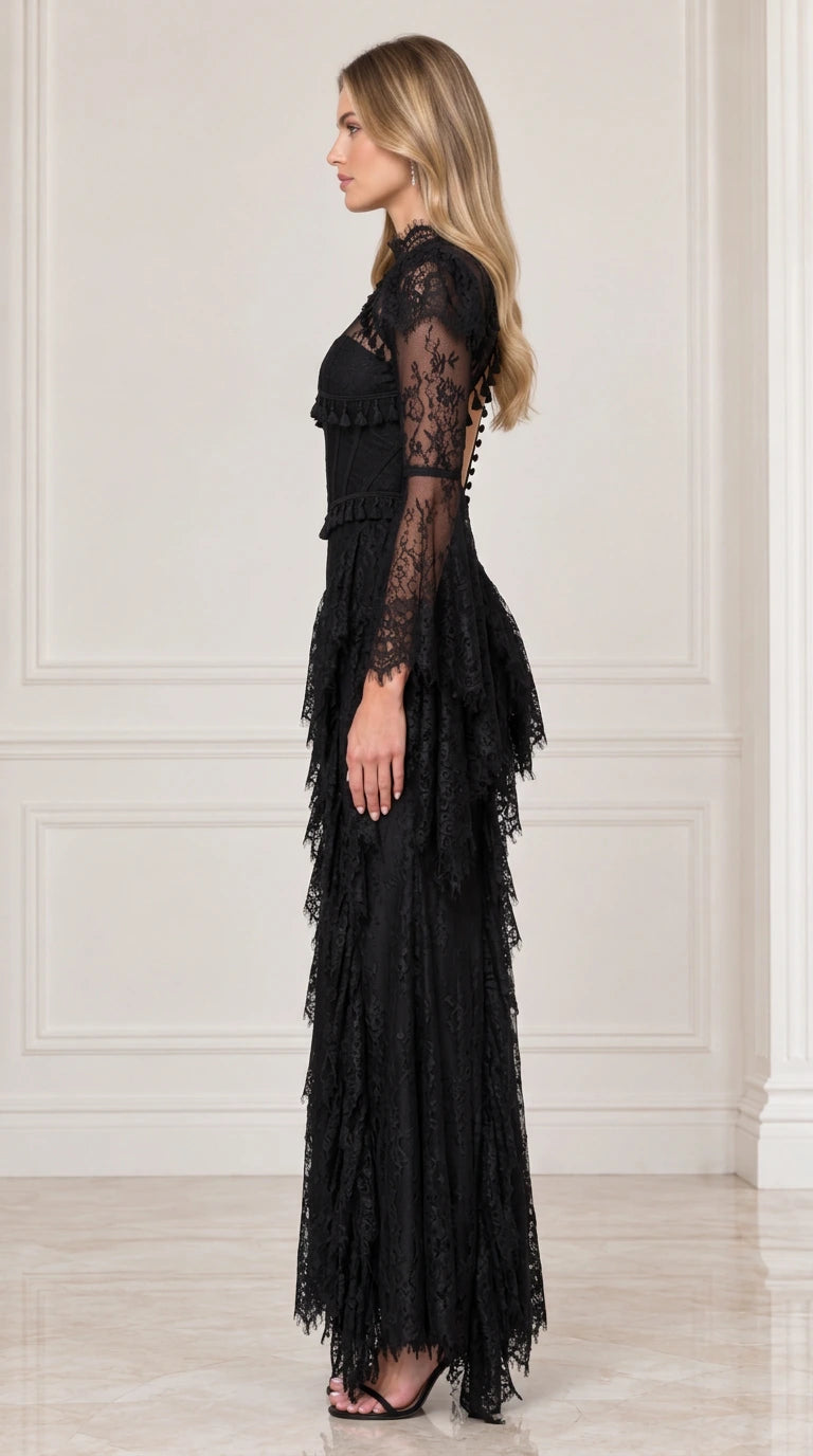 Side profile of black lace formal evening gown showing tiered skirt and silhouette