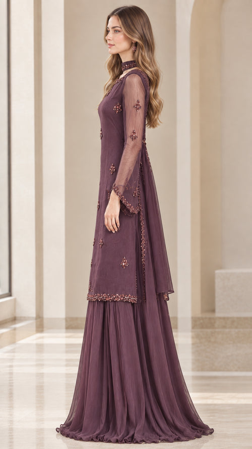 Side profile view of plum long-sleeve tunic and tiered wide-leg pants set