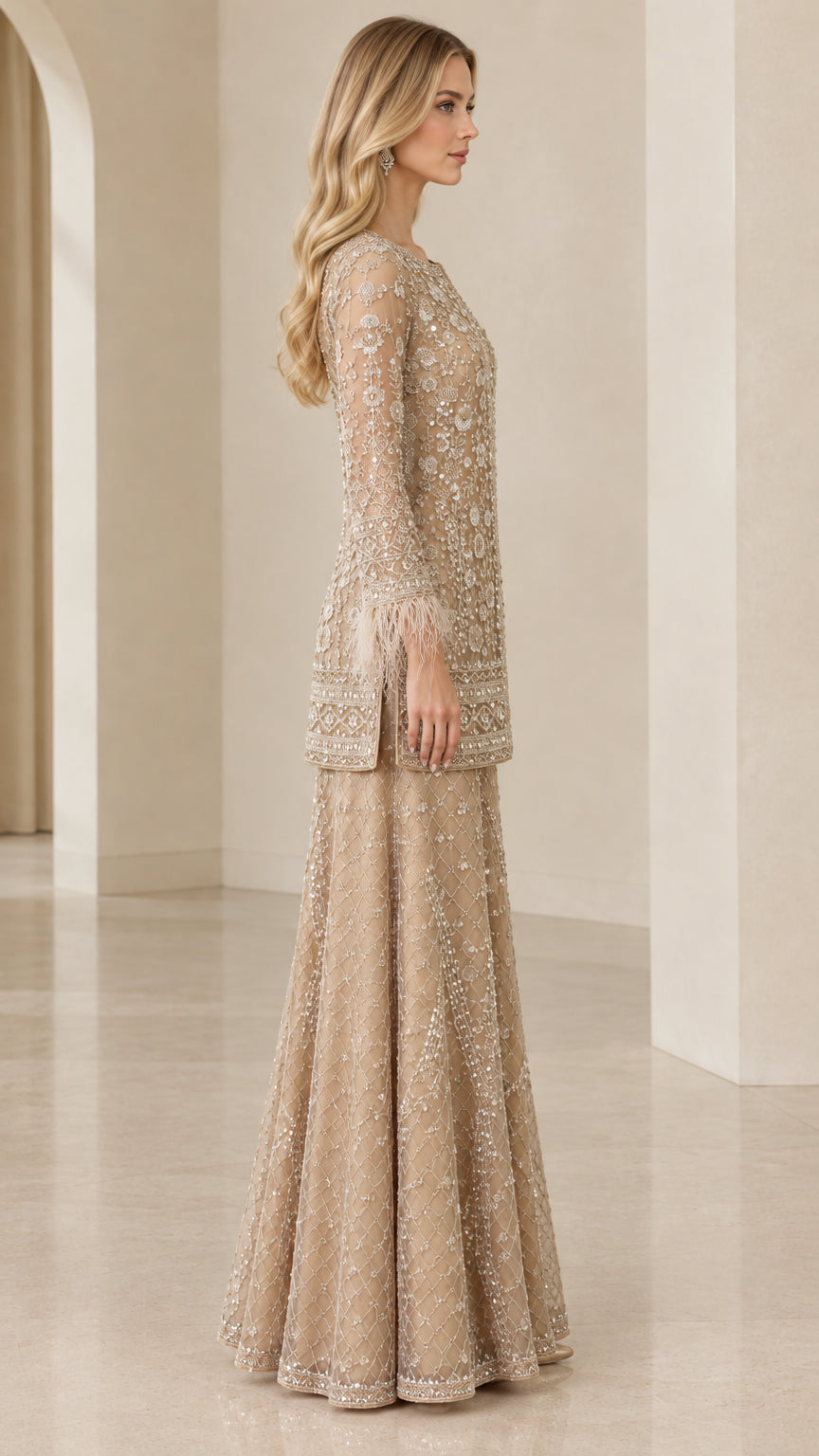 Side profile view of champagne beaded formal two-piece set with feather cuffs