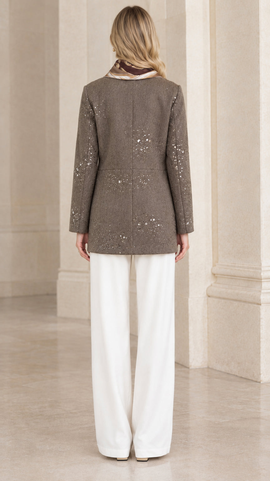 Back view of taupe longline textured tweed jacket with sequin details