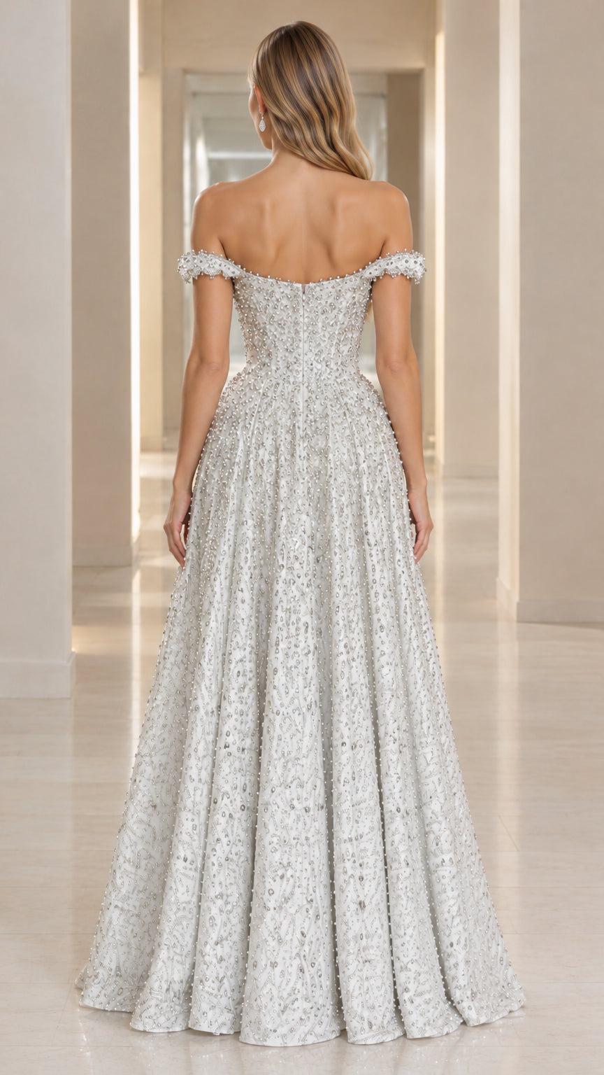 Model wearing silver off-the-shoulder evening dress back view