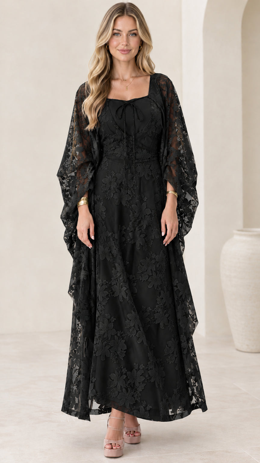 Front full view of black floral lace maxi dress with flowing wide sleeves