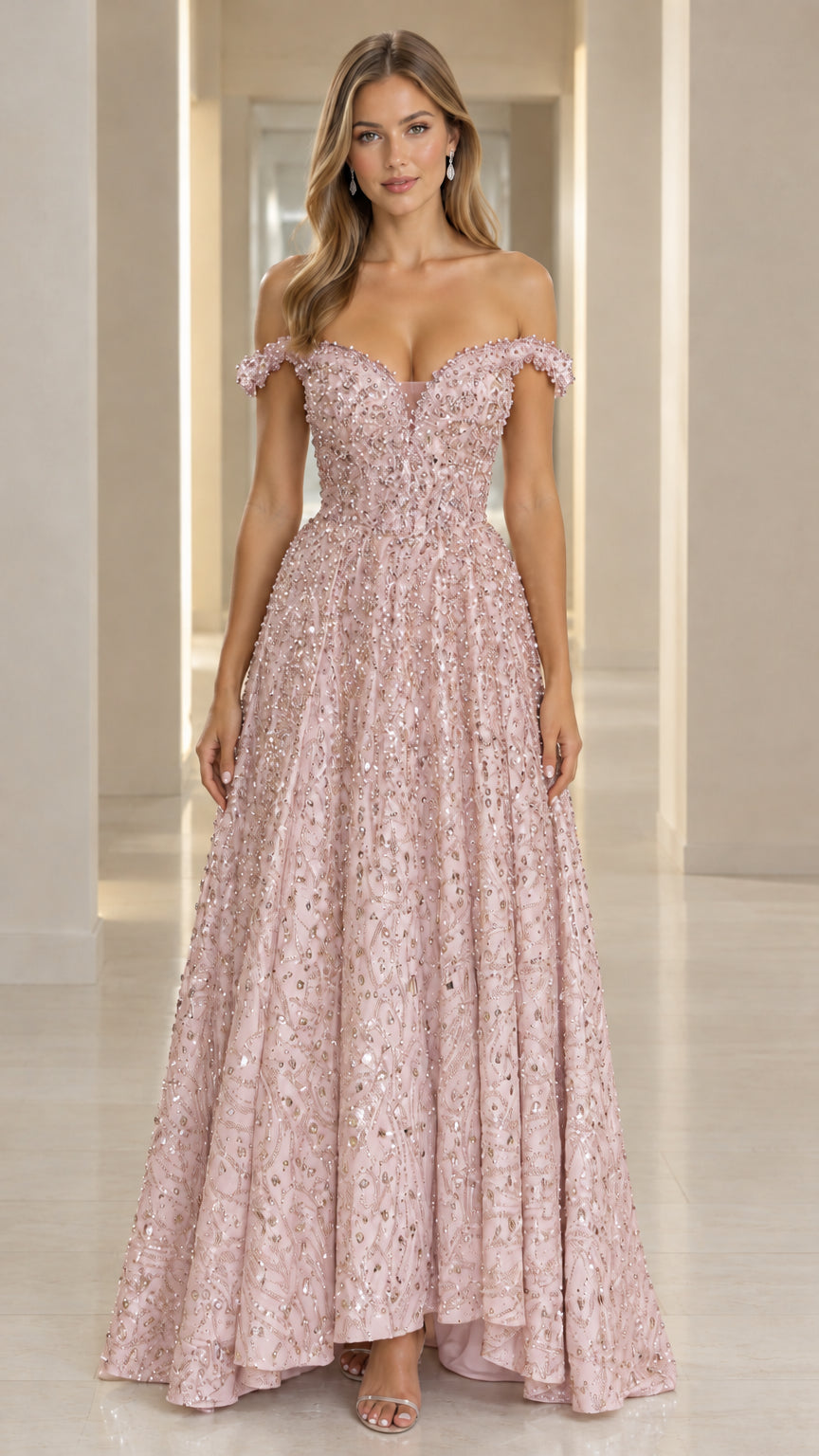 Model wearing blush pink off-the-shoulder beaded maxi dress