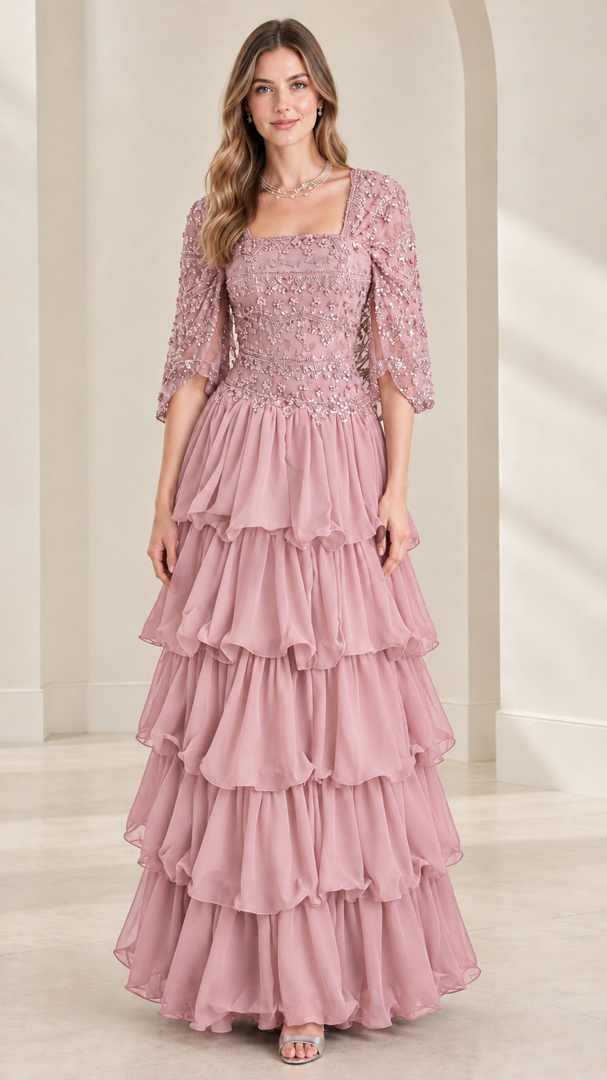 Full view of dusty rose pink sequin beaded tiered ruffle formal evening gown