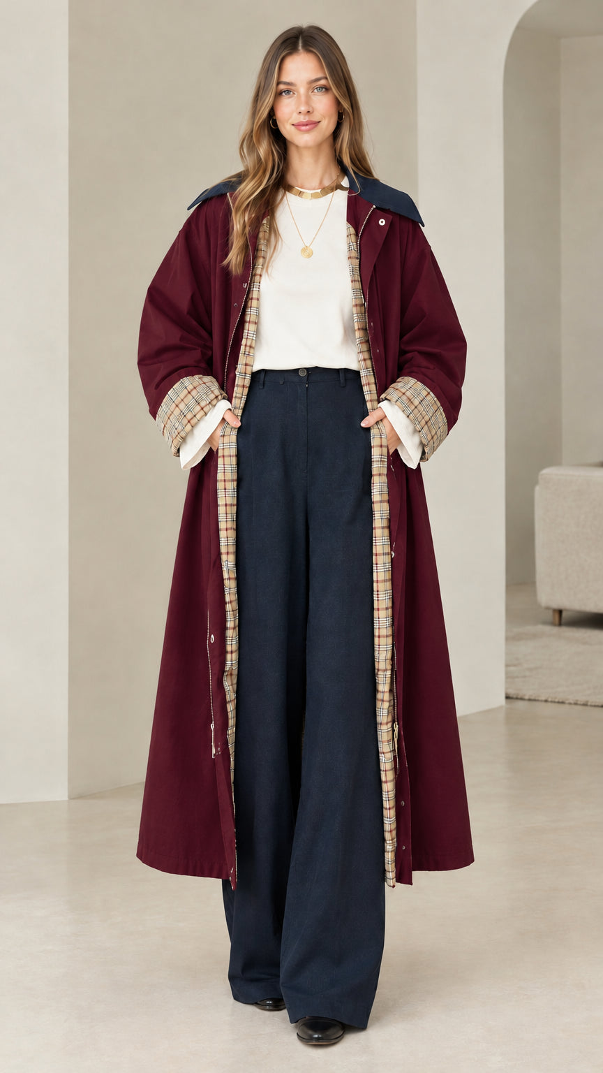 Front view of model wearing burgundy wine longline trench coat
